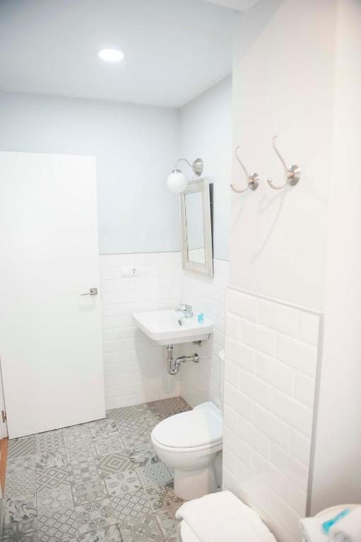 Koupelna v ubytování Hotel Smile & Co Hostal Boutique