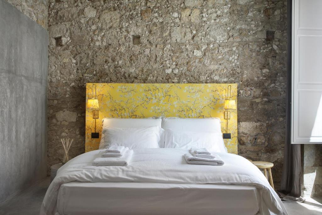 Postel nebo postele na pokoji v ubytování ISONZO SUITES