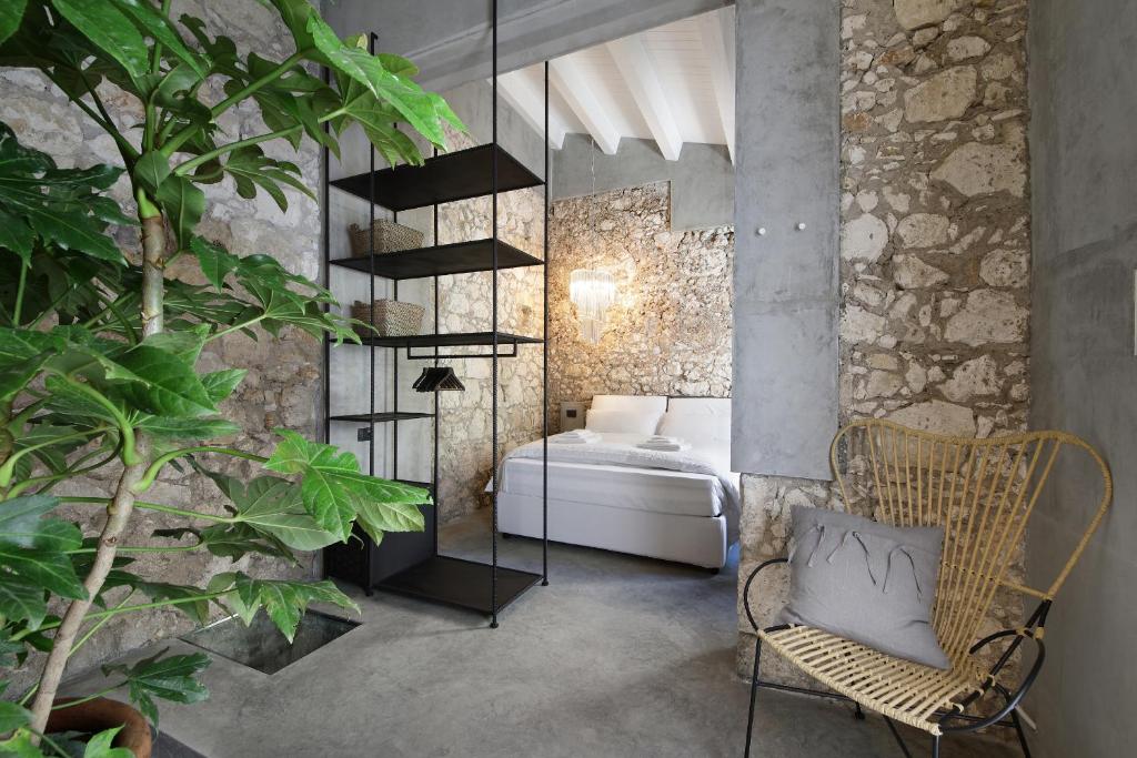 Postel nebo postele na pokoji v ubytování ISONZO SUITES