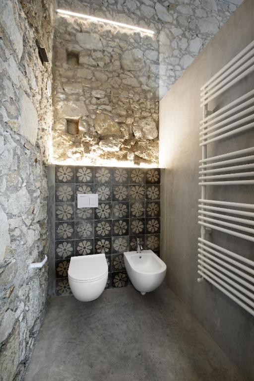 Koupelna v ubytování ISONZO SUITES