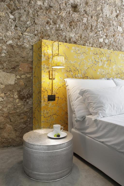 Postel nebo postele na pokoji v ubytování ISONZO SUITES