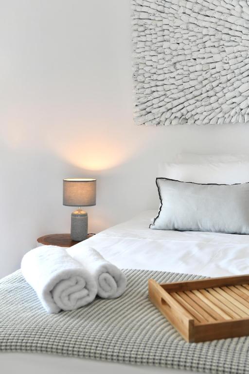 Postel nebo postele na pokoji v ubytování Ciel Villas Paros