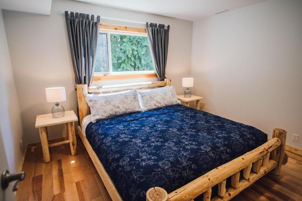 Postel nebo postele na pokoji v ubytování Grizzly Paw B&B