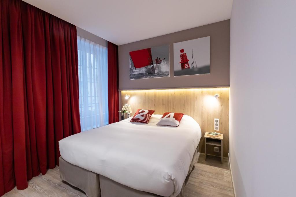 Hôtel des Marins, Saint-Malo客房内的一张或多张床位