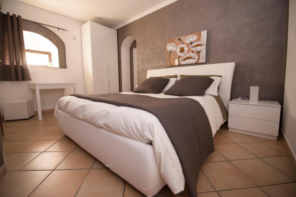 Postel nebo postele na pokoji v ubytování Bed and Breakfast Alberini