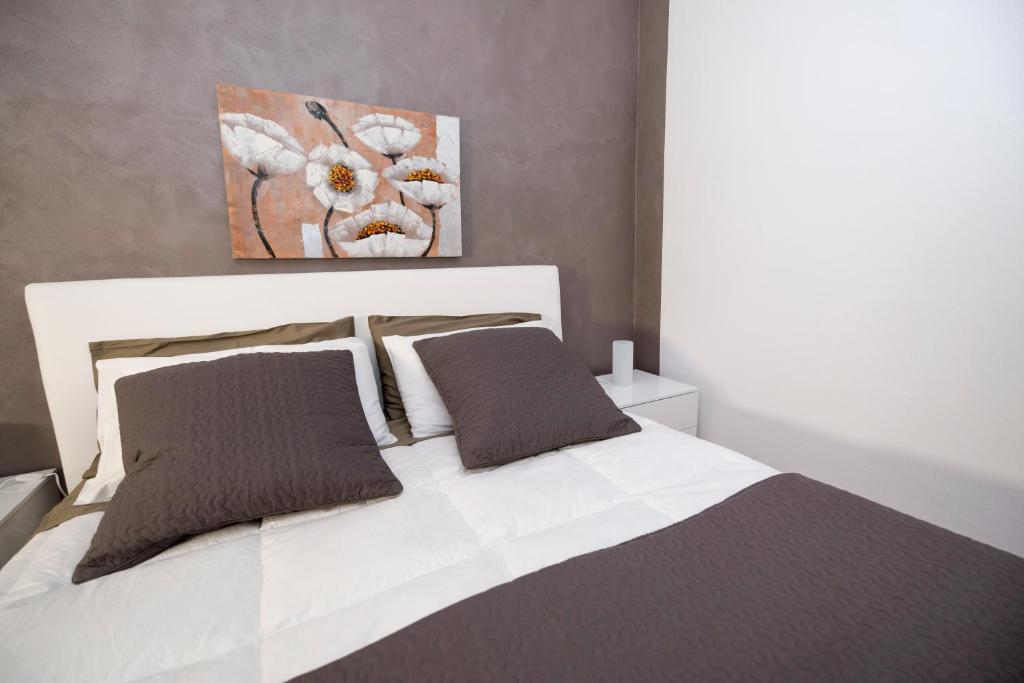 Postel nebo postele na pokoji v ubytování Bed and Breakfast Alberini