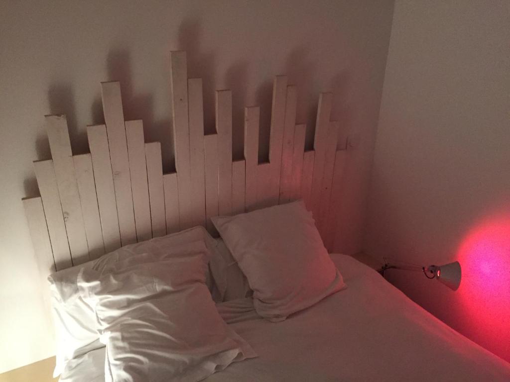 Postel nebo postele na pokoji v ubytování MOODz HOTEL VIENNE
