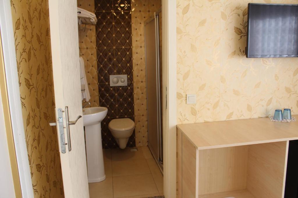 Koupelna v ubytování Omega Inn