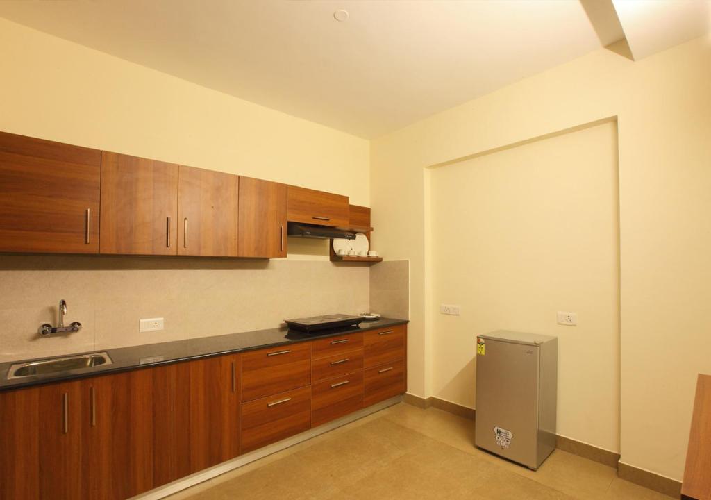 Kuchyň nebo kuchyňský kout v ubytování Laimar Suites