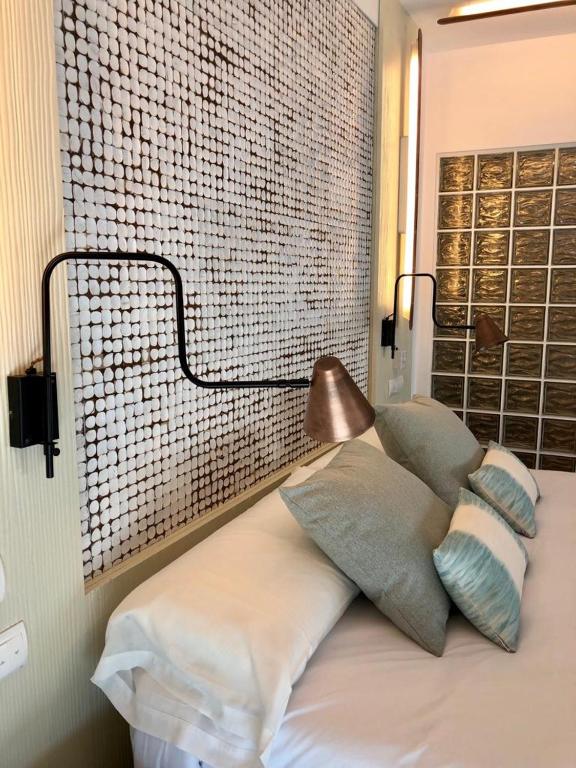 Postel nebo postele na pokoji v ubytování Lux Isla