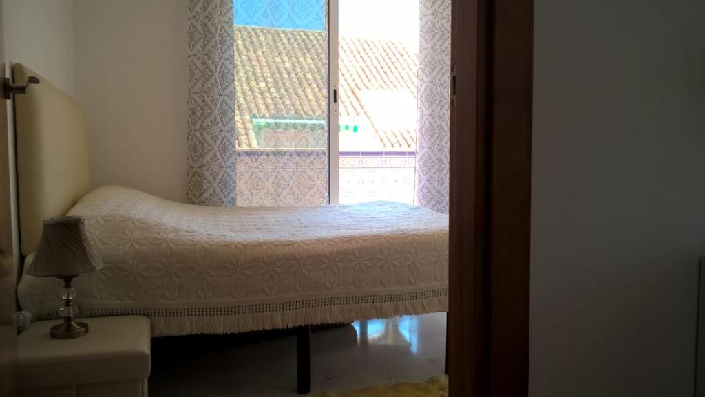 Łóżko lub łóżka w pokoju w obiekcie Apartaments La Cala de Mijas Atico