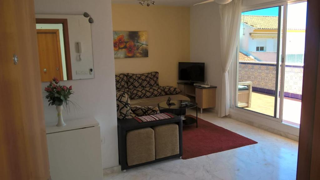Telewizja i/lub zestaw kina domowego w obiekcie Apartaments La Cala de Mijas Atico
