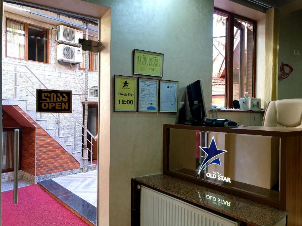 TV a/nebo společenská místnost v ubytování Hotel Old Star
