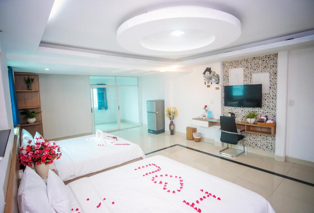Postel nebo postele na pokoji v ubytování H79 HOTEL