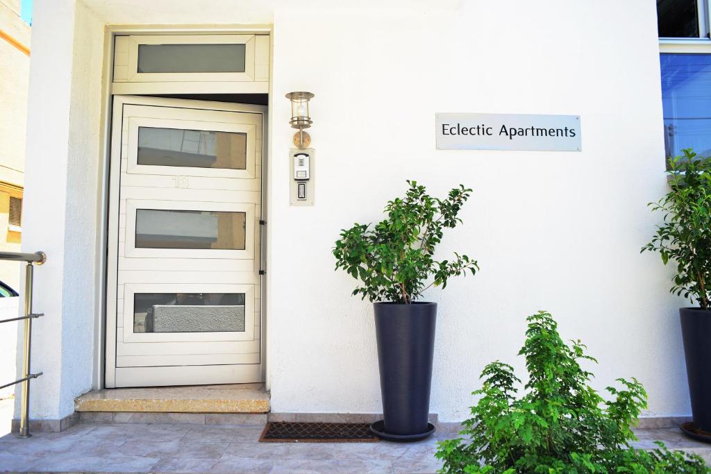 a front door of a house with a plant at Eclectic Business & Leisure in Nicosia