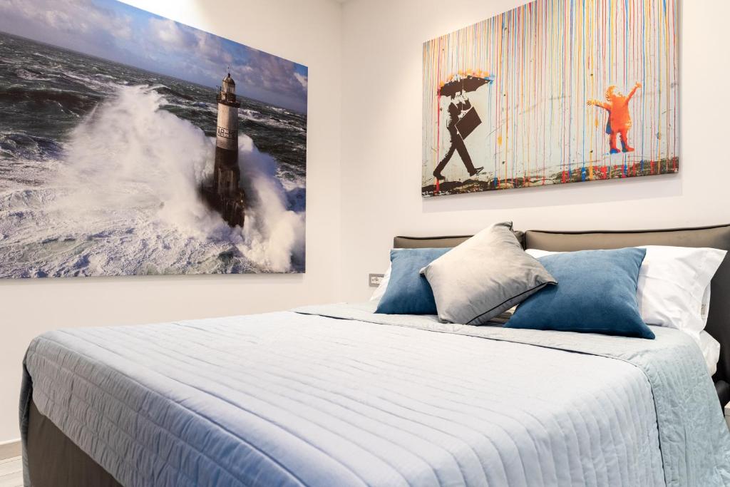 A bed or beds in a room at Cilento Suite - Vinarte B&B