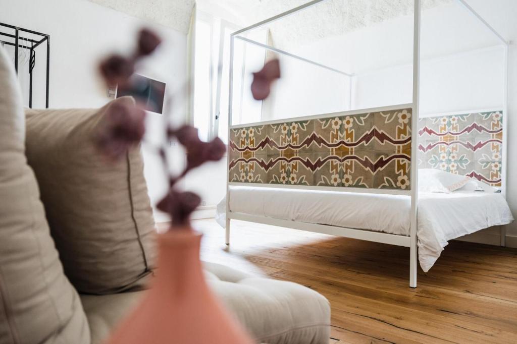 Postel nebo postele na pokoji v ubytování Orazio33 b&b