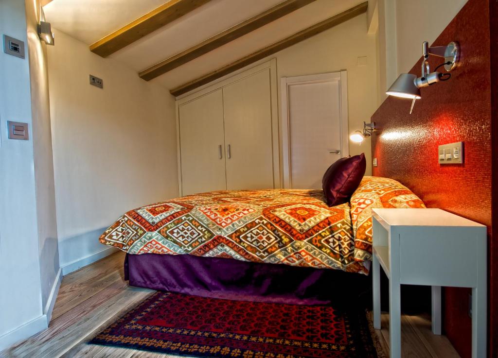 Postel nebo postele na pokoji v ubytování Hotel Albanuracín
