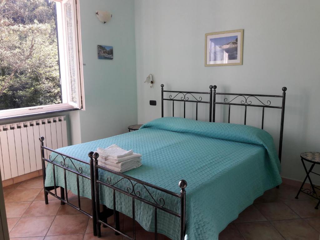 Postel nebo postele na pokoji v ubytování B&B Oasi Verde