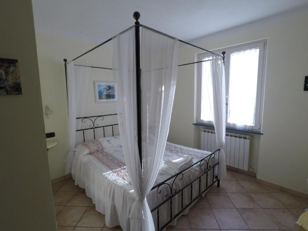 Postel nebo postele na pokoji v ubytování B&B Oasi Verde