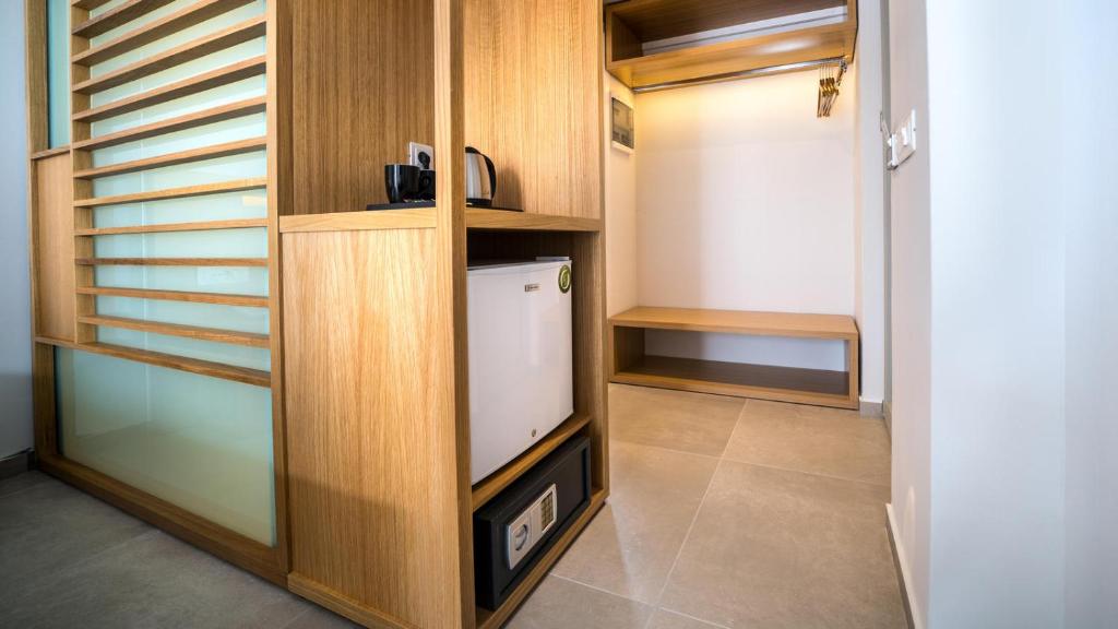 Kuchyň nebo kuchyňský kout v ubytování Adele Beach Hotel