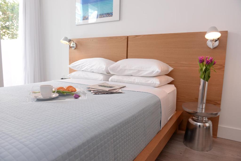 Postel nebo postele na pokoji v ubytování 6080 Design Hotel by Eskape Collection