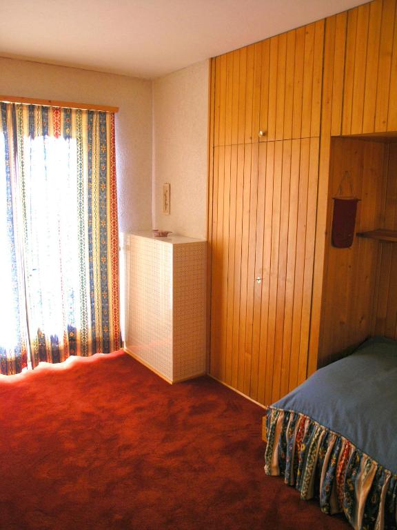 Postel nebo postele na pokoji v ubytování Arche de Noé B&B