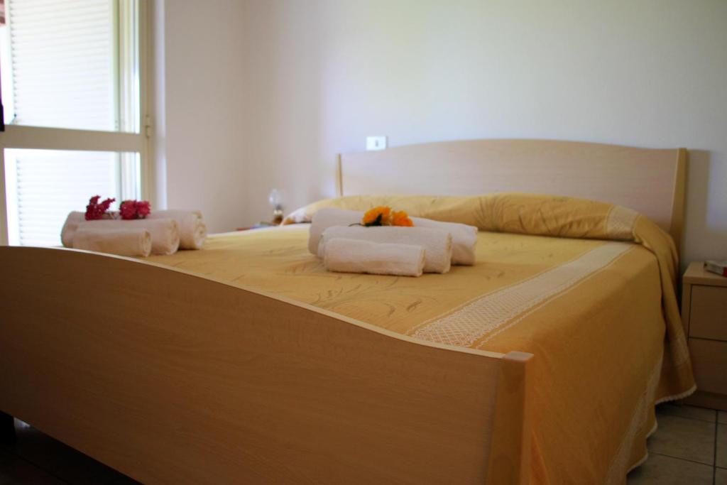 Postel nebo postele na pokoji v ubytování Hotel L'Ancora