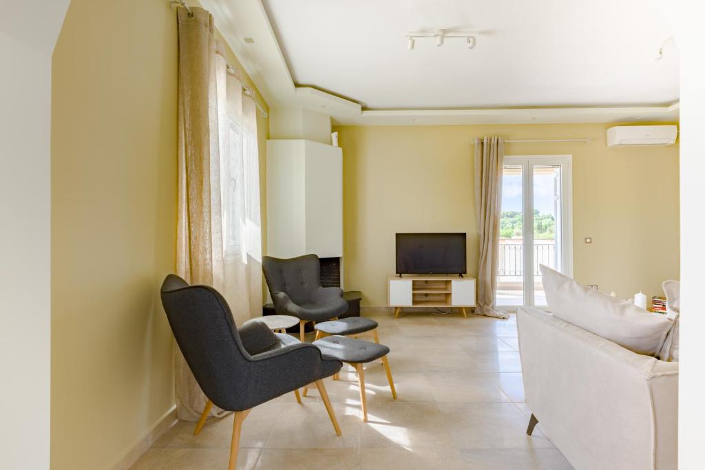 TV a/nebo společenská místnost v ubytování The Leaf House - Kefalonia