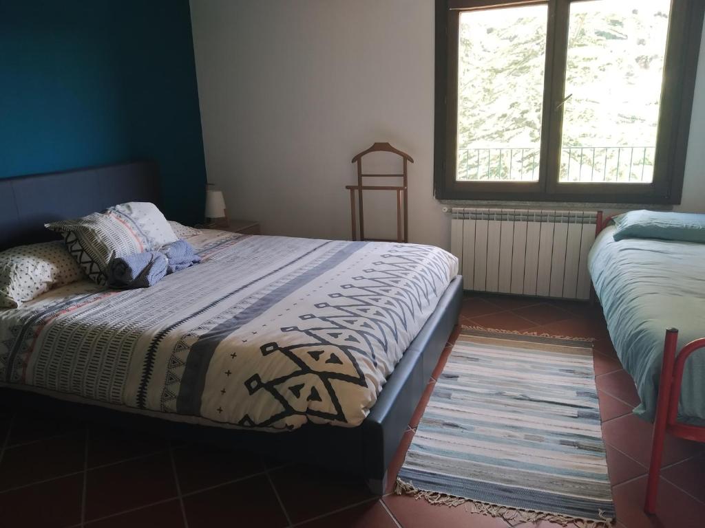 Postel nebo postele na pokoji v ubytování B&B Taccu Maccu