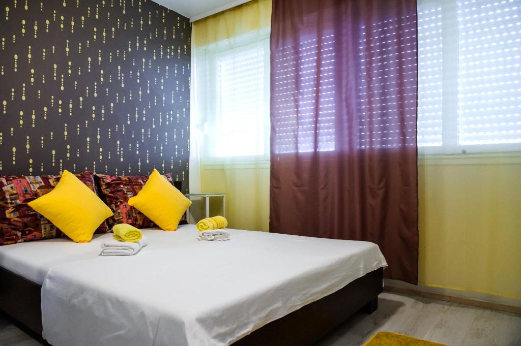 Posteľ alebo postele v izbe v ubytovaní Apartment Adrian