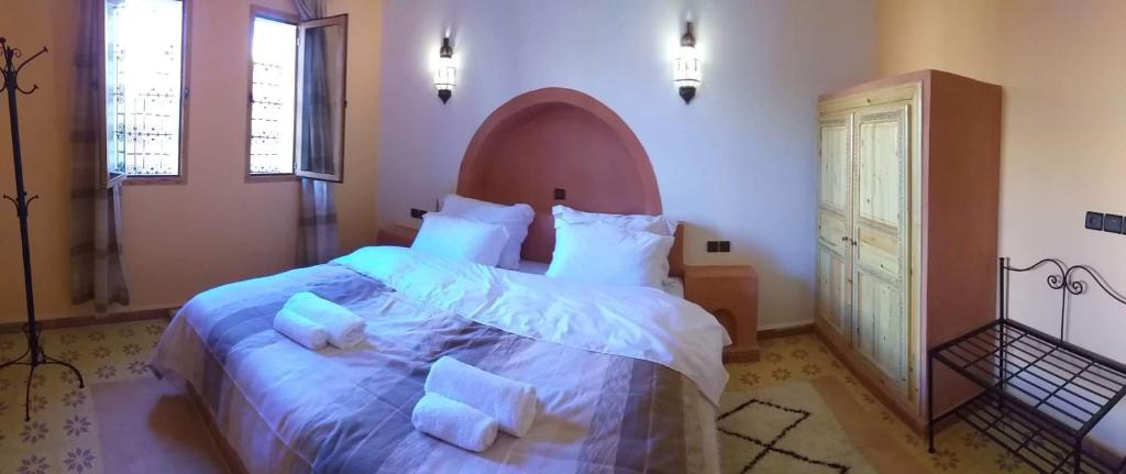 Postel nebo postele na pokoji v ubytování Hassilabiad Appart Hotel