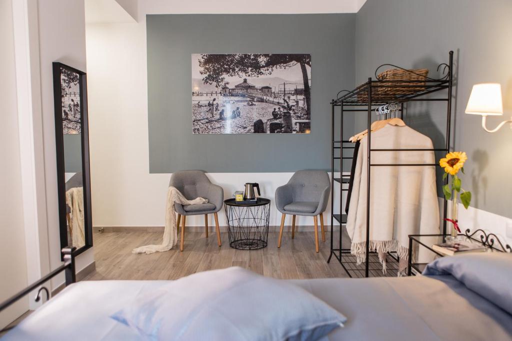 Postel nebo postele na pokoji v ubytování Demithos Rooms