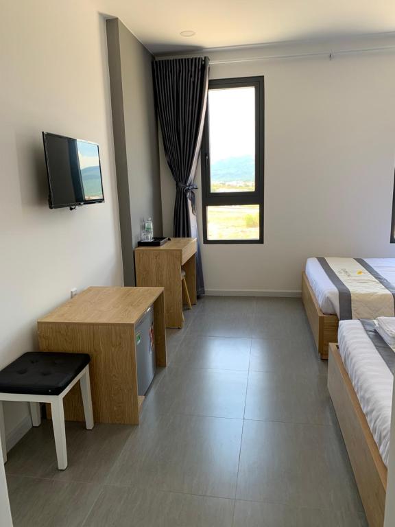 Postel nebo postele na pokoji v ubytování Summering Hotel