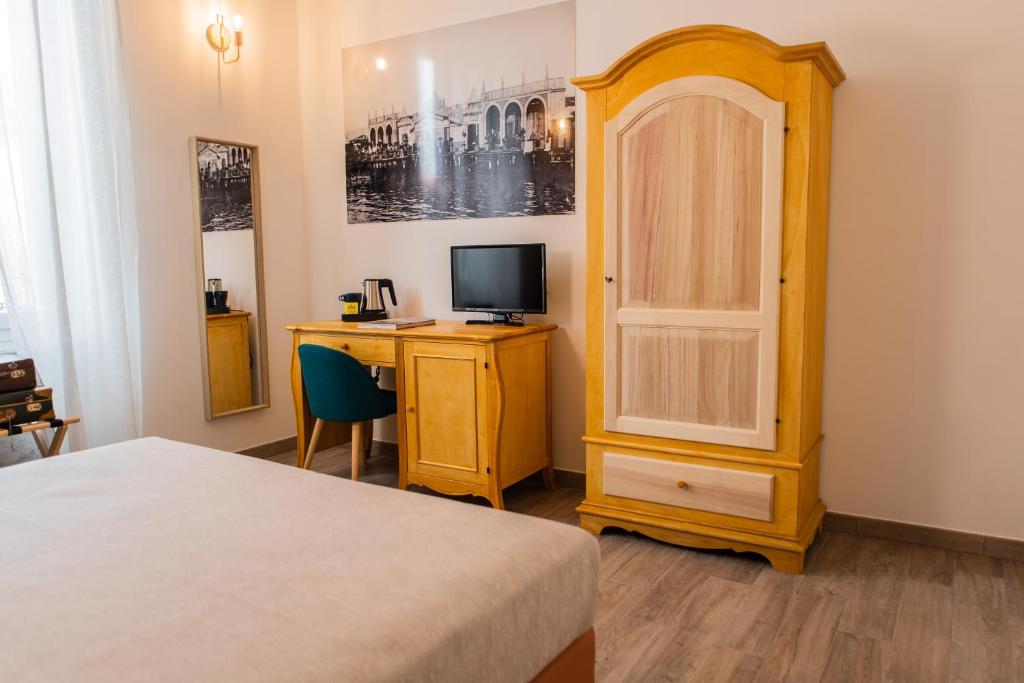 Postel nebo postele na pokoji v ubytování Demithos Rooms