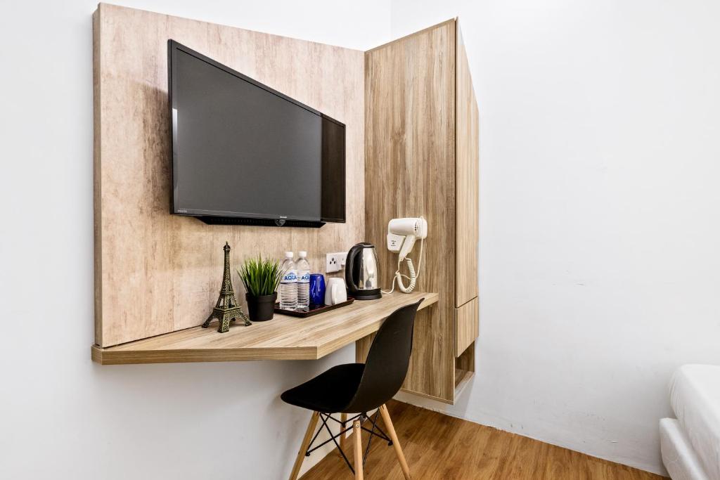 TV a/nebo společenská místnost v ubytování Rica Hotel Usj