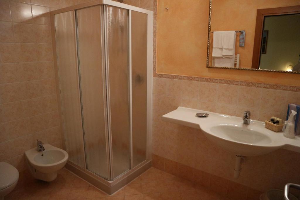 Koupelna v ubytování Hotel Camoretti