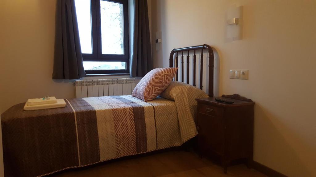 Posteľ alebo postele v izbe v ubytovaní La Posada del Druida