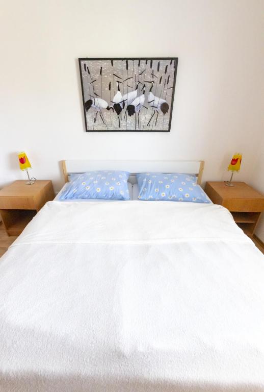 Postel nebo postele na pokoji v ubytování Apartman Hugo