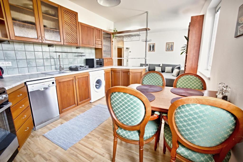 Kuchyň nebo kuchyňský kout v ubytování Apartman Hugo