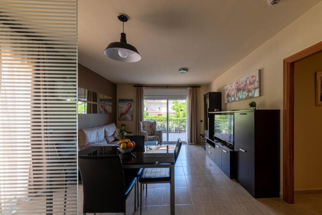 Kuchyň nebo kuchyňský kout v ubytování Golden Beach Apartamentos
