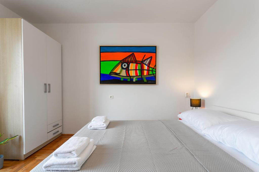 Posteľ alebo postele v izbe v ubytovaní Central View Apartment