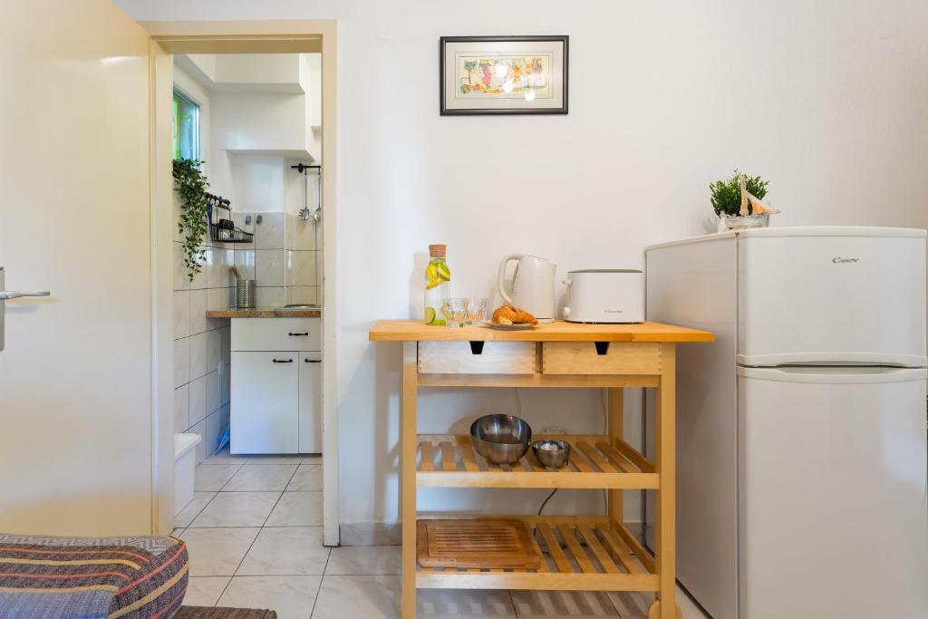Kuchyňa alebo kuchynka v ubytovaní Central View Apartment