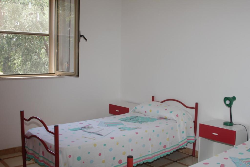 Llit o llits en una habitació de Albergo 2 Pini