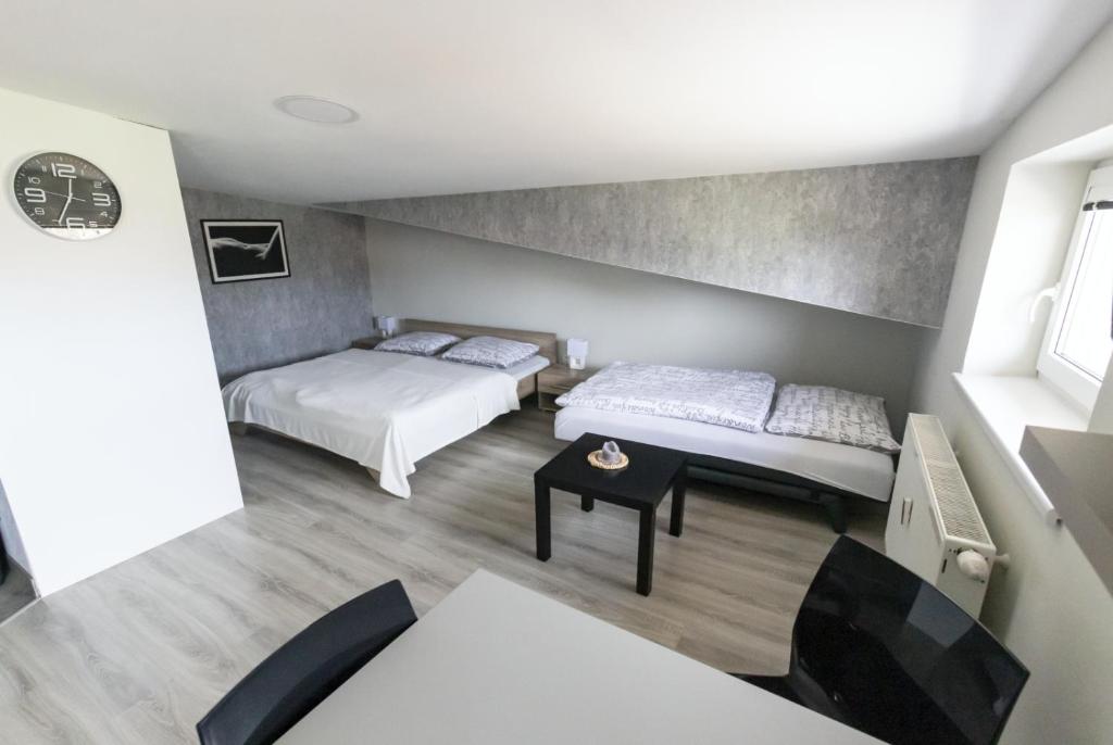 Postel nebo postele na pokoji v ubytování Apartmán Theo