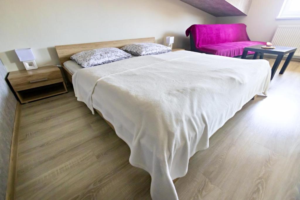 Postel nebo postele na pokoji v ubytování Apartmán Theo