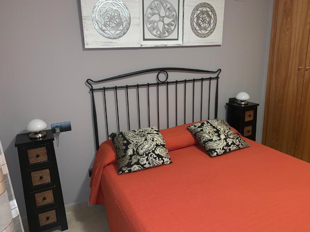 Postel nebo postele na pokoji v ubytování Golden Beach Apartamentos