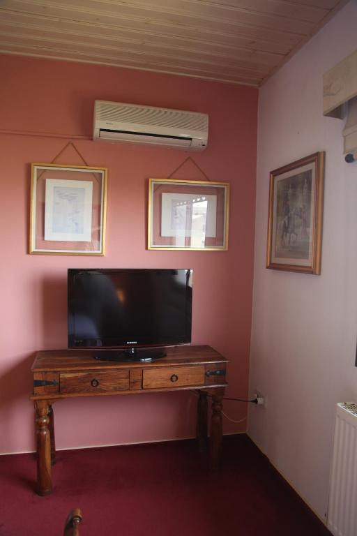 TV a/nebo společenská místnost v ubytování Residence L' Aubrais
