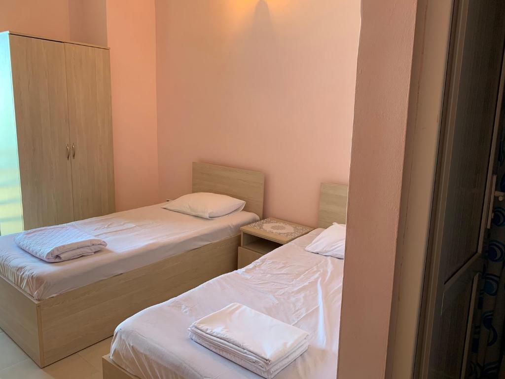 Postel nebo postele na pokoji v ubytování SBakuri