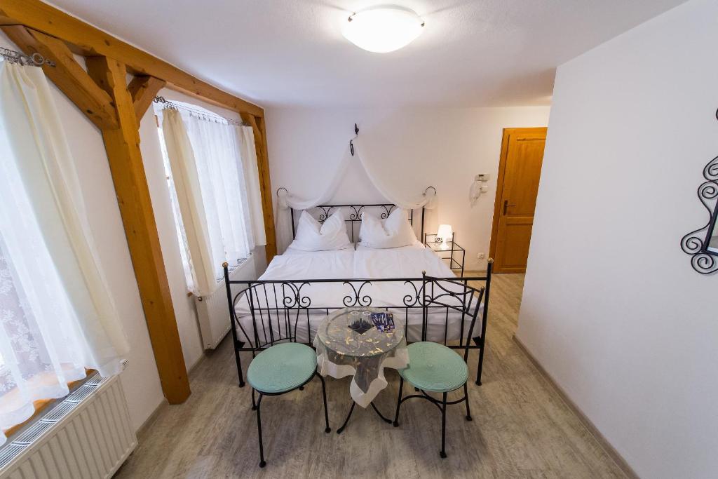 Łóżko lub łóżka w pokoju w obiekcie Pension U Zámku